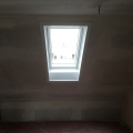 Dachfenster in Holzgaube